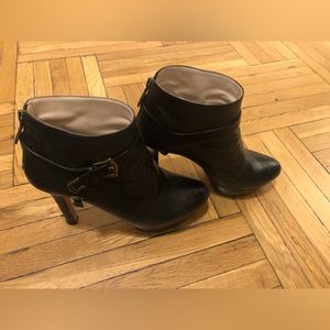 Prada boots size 9 1/2. Brass hardware.  Good condition.
